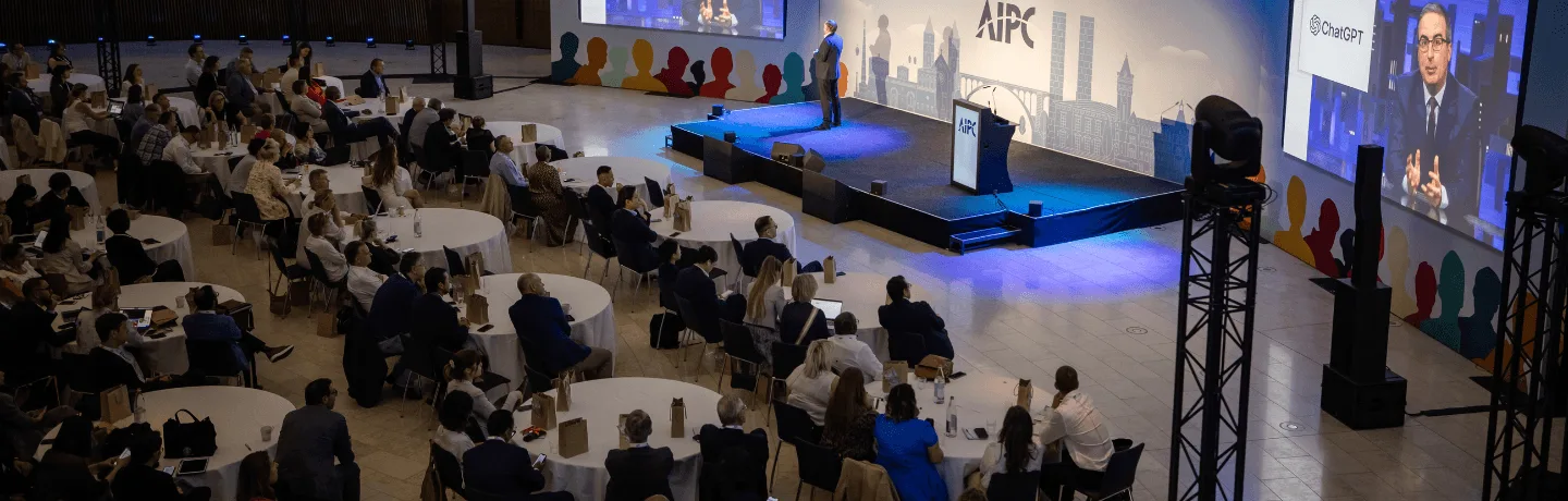 AI Expert Andrew Grill on stage in Luxembourg speaking about the power of AI