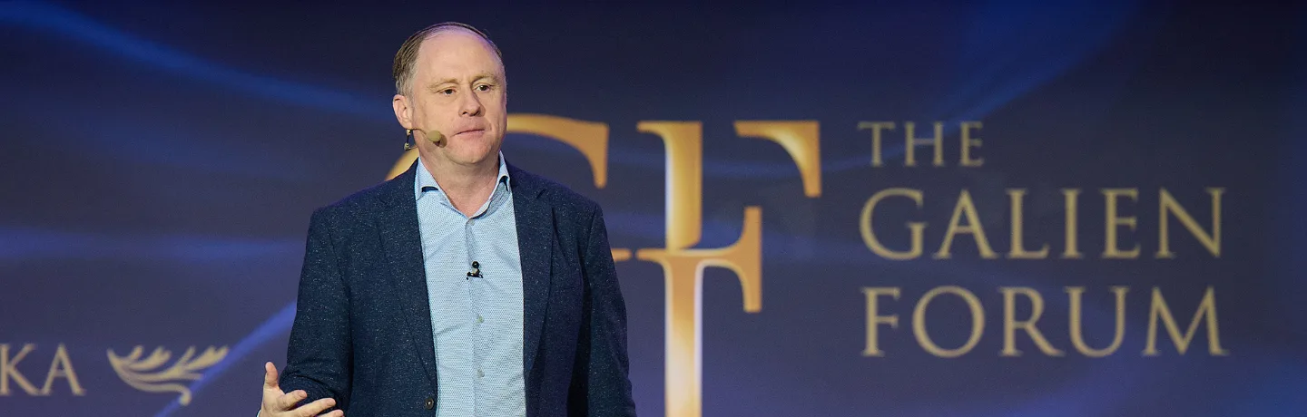 AI Expert Andrew Grill on stage at the Galien Foundation event in Warsaw, Poland