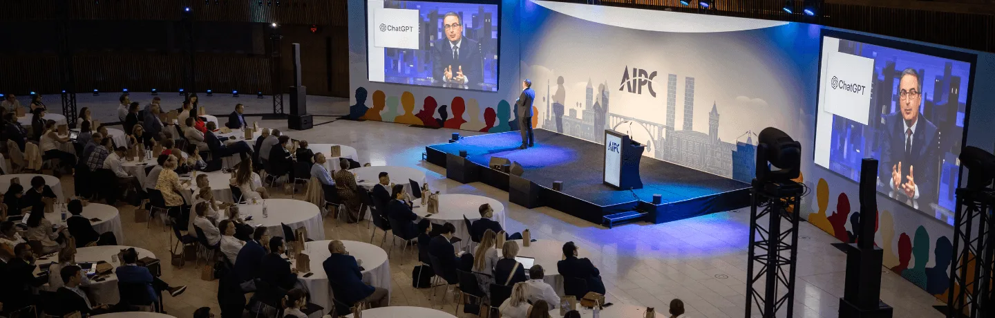 AI Expert Andrew Grill on stage in Luxembourg speaking about the power of AI