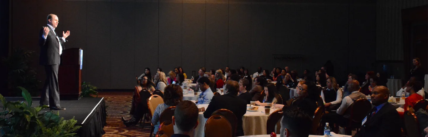 Andrew Grill on stage in Las Vegas