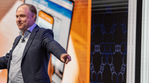 Andrew Grill on stage in Dubai speaking to the Discover Global Partners event