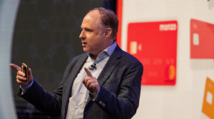 Andrew Grill on stage in Dubai speaking to the Discover Global Partners event