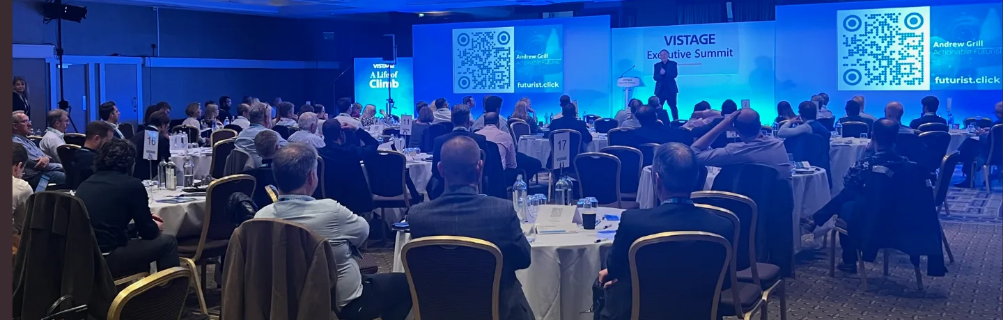 Andrew Grill on stage at the Vistage Executive Summit on Manchester