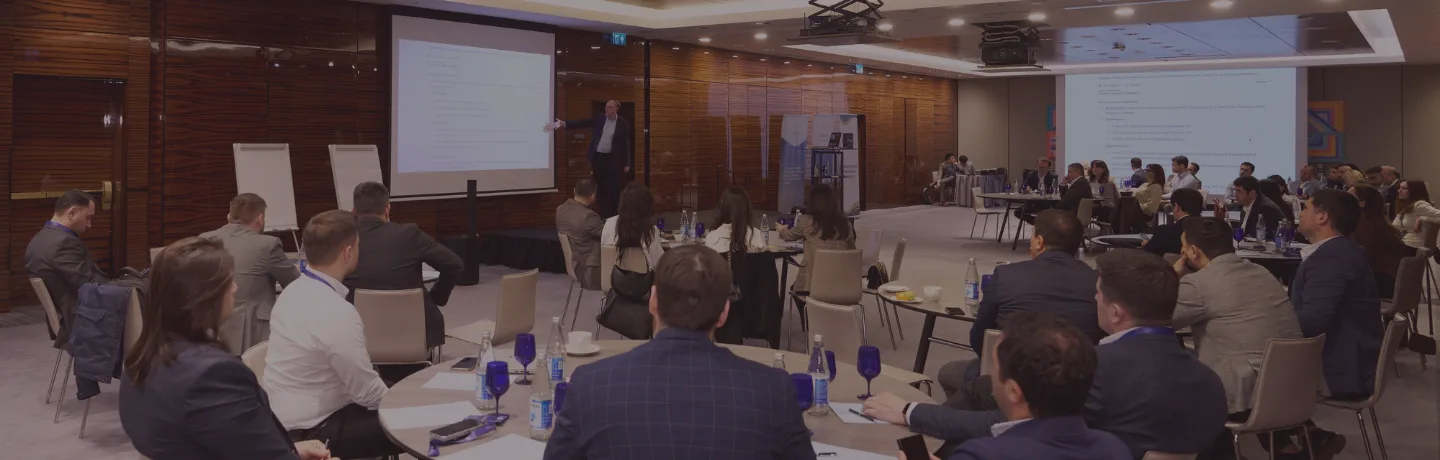 Andrew Grill speaking at Neqsol Executive Summit in Baku, Azerbaijan